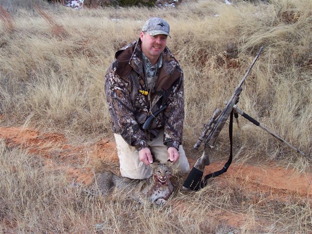 Joe Allison and Oklahoma bobcat.
